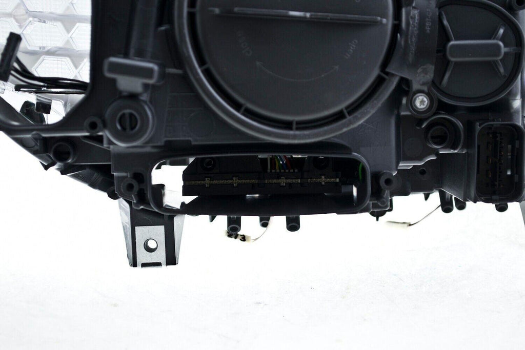 Hella Headlight Assembly for BMW 010131651