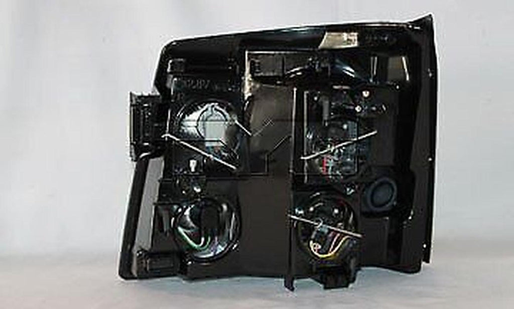 TYC Headlight Assembly for Cadillac 20-6709-00